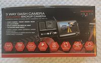 Photo of the product box highlighting key features such as 3 way camera, 4.0 inch LCD screen, 1080p HD recording, 120 degree wide angle lens, parking control, rear camera, loop recording, motion detection, G-sensor.