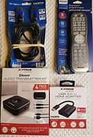 Photo showing QTech HDMI cable in packaging, Philips Bluetooth universal remote, Xtreme Theater Bluetooth audio transmitter kit box, and Xtreme Theater USB HDMI adapter box.