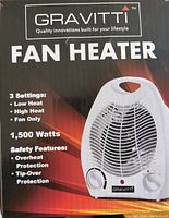 Photo of the original box showing the brand Gravitti fan heater, listing 3 settings, power wattage, and safety features.