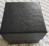 Closed black textured jewelry box