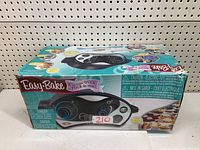 Easy Bake Oven in original box showing front side with product image and brand name.