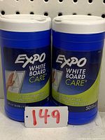 Two blue and white containers of EXPO Whiteboard Care Cleaning Wipes, each with 50 wipes, showing front label and branding.
