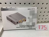 Box of PROZOR PST158 Digital to Analog Converter showing product image and model number.