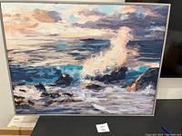 Full frontal view of the framed acrylic sea painting showcasing the crashing waves and clouded sky, size approximately 41 by 31 inches.