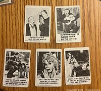 Front of five vintage 1960s The Munsters trading cards with black and white images and humorous captions.