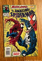 Front cover of The Amazing Spider-Man #328 comic showing Spider-Man, Venom, and Carnage characters.