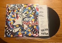 Front cover of Cheap Trick 'The Doctor' vinyl with record and inner sleeve laid out