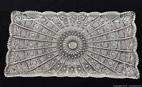 Top view showing full intricate cut pattern of rectangular crystal tray, displayed on black background.
