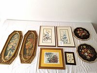 Full layout of all 8 floral art pieces showing variety of frame shapes, sizes and styles.