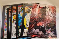 Lot of seven comic book posters including Marvel and Batman posters, all sleeved and stacked