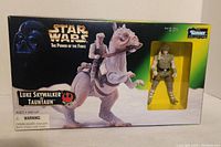 Front view of the boxed Star Wars Luke Skywalker and Tauntaun action figure set by Kenner Collection with clear window showing Luke Skywalker figure.
