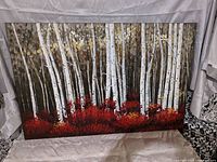 Front view of the large painting 'Birches' featuring white birch trees and red foliage.