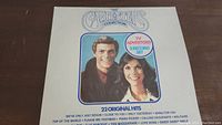 Front cover of The Carpenters Collection vinyl album showing photo of Richard and Karen Carpenter and the title with TV advertised 2 record set label.