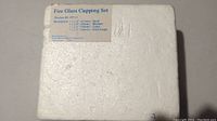 Styrofoam packaging box with printed label showing product ID and size description of fire glass cupping set.