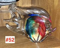 Side view of multi-coloured sommerso glass fish sculpture showing clear glass with vibrant inner colors and detailed fins.