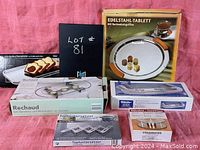 Photo showing all seven items together with boxes, highlighting the variety of food warming and serving products included.