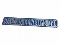 Close-up image of the Dallas Cowboys street sign showing blue embossed text on a white background with minor scratches.