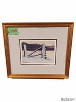 Frontal view of the framed pastel painting showing the winter fence scene with snow and distant trees, gold-tone frame and white matting visible.