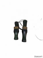 Top view of two green and brass Ducks Unlimited duck calls connected by a chain on a white background.