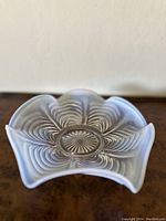 Top view of the Northwood glass bowl showing the ruffled edge and swirl pattern at the center.