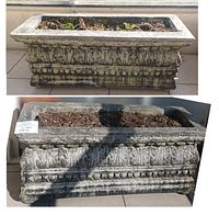 Pair of rectangular concrete planters on balcony, shows decorative relief pattern