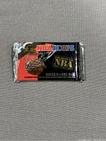 Front view of sealed 1993-94 NBA Hoops Series 2 basketball cards wax pack showing brand logo, basketball, and foil design.