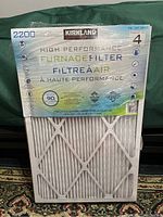 Front view of Kirkland 2200 furnace filters pack showing packaging with brand, model, and filter type details.