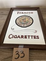 Clear front view of the framed Player's Navy Cut Tobacco Cigarettes mirrored advertising sign.