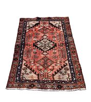 Full view of rectangular Persian Hamedan wool rug with geometric central medallion and floral border patterns in natural dye colors.