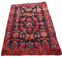 Full view of rug on white background showing overall pattern and colors