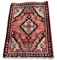 Full view of Persian Hamedan mat with intricate geometric floral and diamond medallion patterns in red, cream, black, and blue shades.