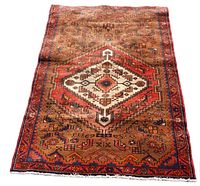 Full view of the rectangular Persian Zanjan nomadic rug showing central diamond medallion and colorful geometric borders.