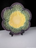 Top view of Olfaire cabbage leaf platter showing detailed leaf texture and color variations in yellow, green, and purple