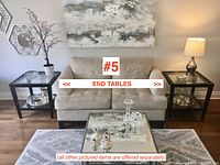 Both end tables placed on either side of a beige sofa in a living room setting, showing overall size and style.