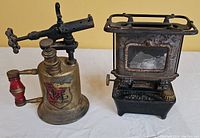 Blow torch and lamp/cooker side view showing the design and scale.