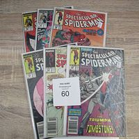 Six Marvel The Spectacular Spider-Man comics from late 80s, displayed fanned out showing full covers.
