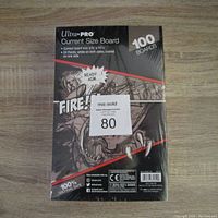 Pack of Ultra Pro comic book backing boards showing branding and product information on front.
