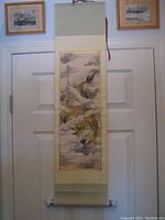 Full view of the hanging scroll showing the entire dragon design and fabric border.
