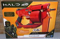 Boxed Nerf Halo Mangler dart blaster showing front of the packaging with product image and Master Chief character illustration.