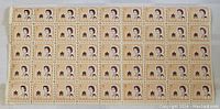 Full view of block of beige 5 cent Canadian stamps featuring Queen Elizabeth II and a maple leaf symbol, 1967 vintage.