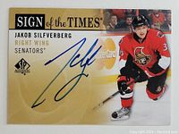 Front of the hockey card showing Jakob Silfverberg in Ottawa Senators uniform with his autograph across the front.