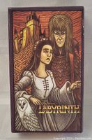 Closed box of Labyrinth movie themed tarot cards showing artwork of Sarah, Jareth, and an owl with a Labyrinth in background.