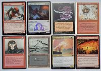 Top view of eight Magic: The Gathering cards arranged in two rows of four, showing the art and card text.