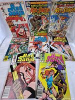 Photo showing 9 Marvel Red Sonja comic books laid out with visible colorful covers featuring the character on each.