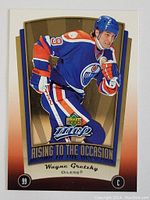 Front side of Wayne Gretzky 2005 Upper Deck MVP hockey card numbered 99 showing Gretzky in Oilers uniform skating.