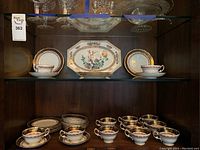 Overall display showing cups, saucers, side plates and central platter