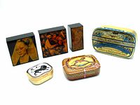 Six assorted vintage tiny boxes and tins with graphic designs, grouped together showing variety of artwork and shapes