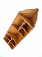 Top/front angled view showing compartments and wood grain