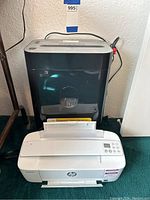 Royal PX 1220 crosscut shredder and HP DeskJet 3755 printer placed side by side on a green carpet