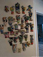 Overall view of all wall pocket vases arranged on wall